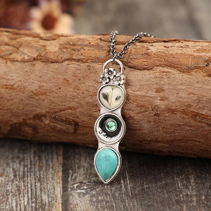Collier barre avec un hibou turquoise de sagesse
