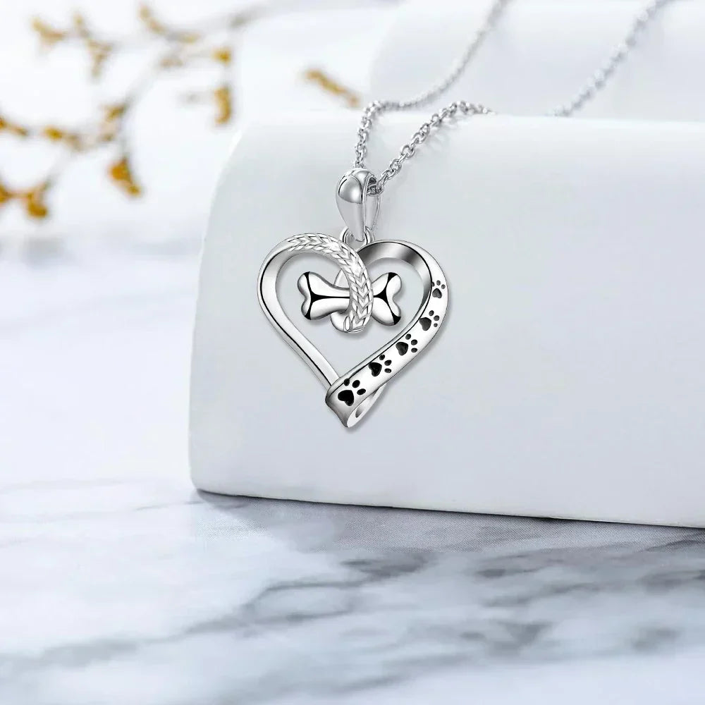 Ensemble de bijoux 2 pièces avec pendentif patte, cœur et os