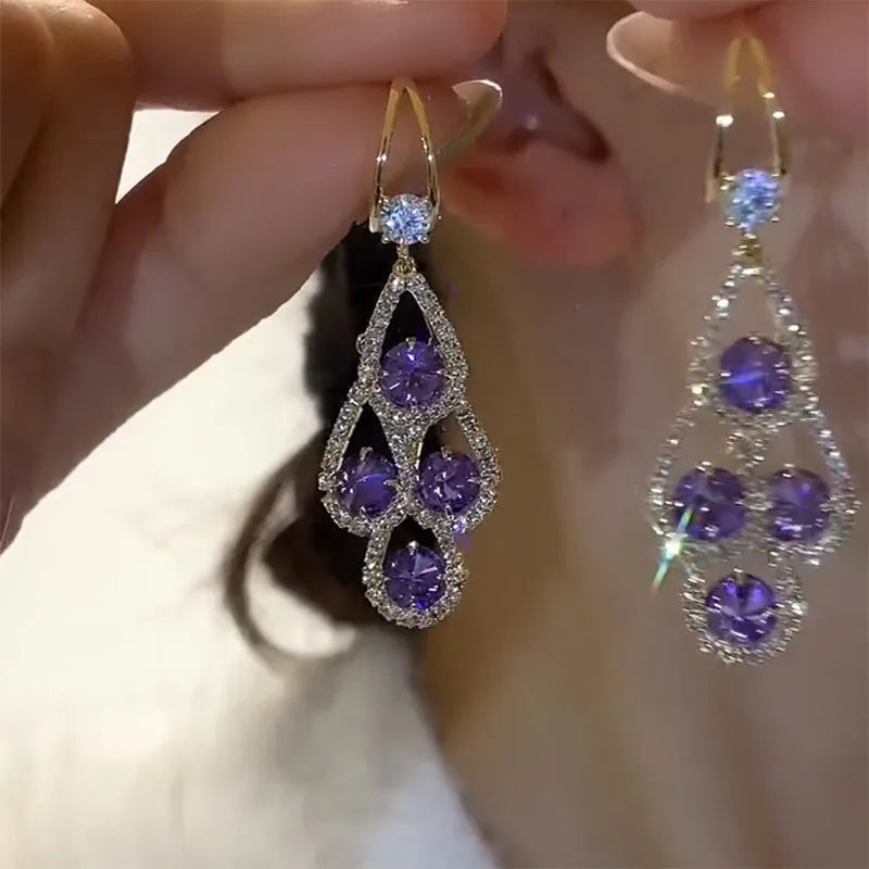 Boucles d'oreilles pendantes cristal violet