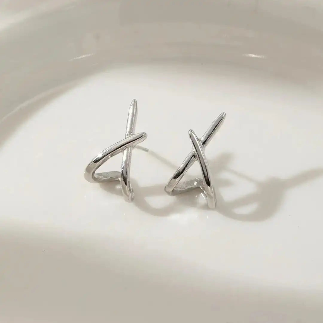 Boucles d'oreilles croix en or intemporelles