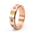 Bague en acier inoxydable en forme de patte anti-stress avec des pattes arc-en-ciel