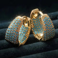 Boucles d'oreilles en anneau doré ornées de fleurs turquoise