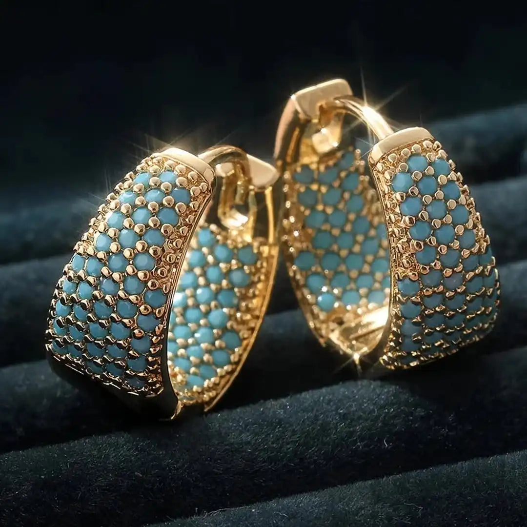 Boucles d'oreilles en anneau doré ornées de fleurs turquoise