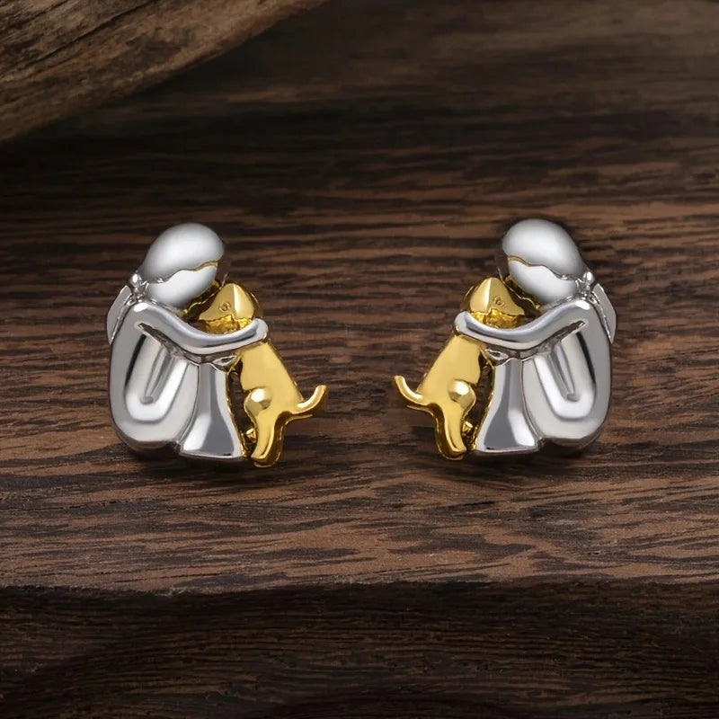 Boucles d'oreilles en argent et or bicolores en forme de câlin