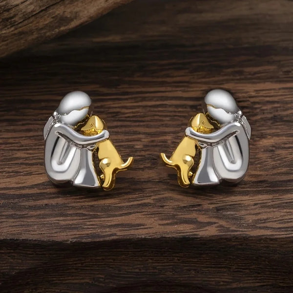 Boucles d'oreilles en argent et or bicolores en forme de câlin