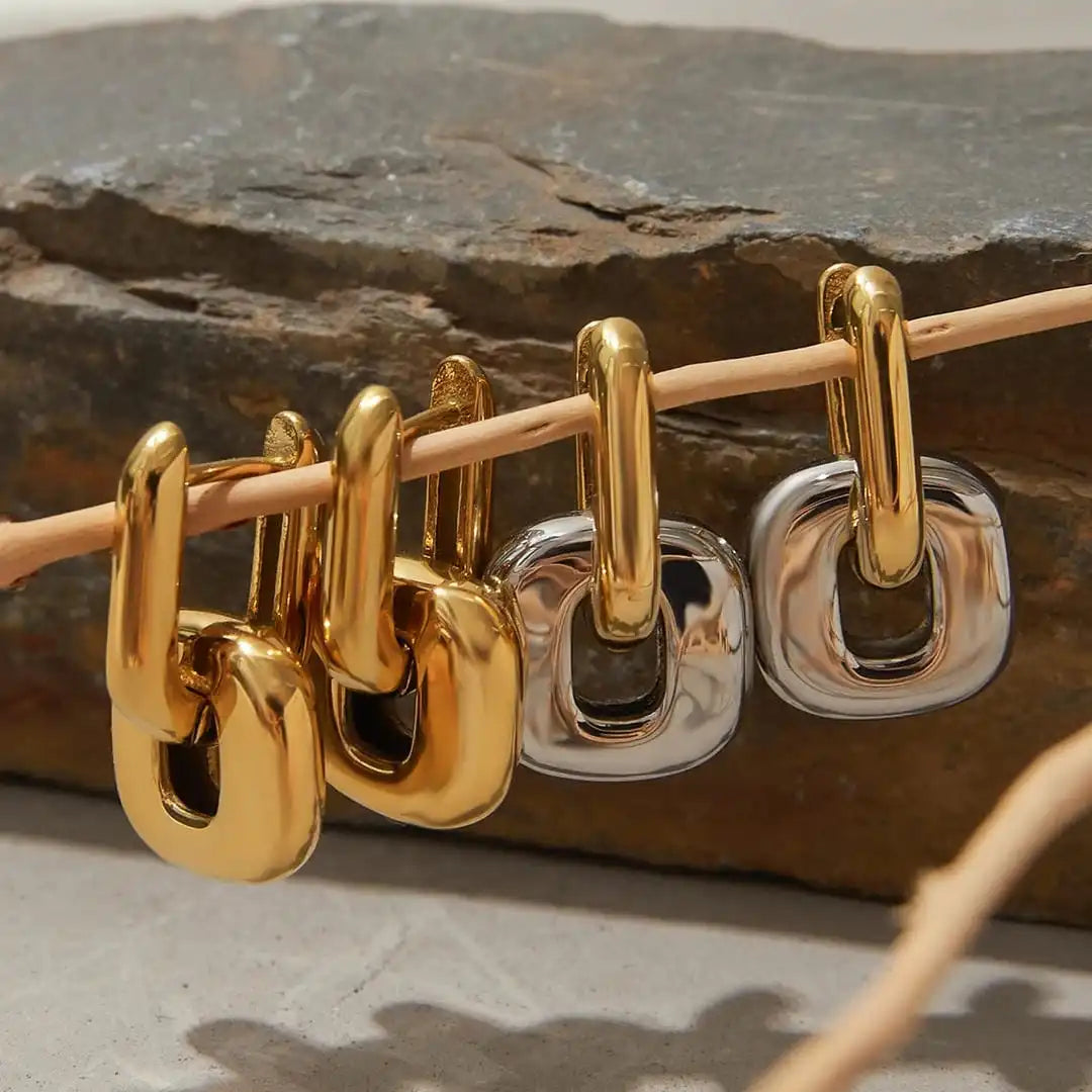 Boucles d'oreilles ovales en or bicolore minimalistes
