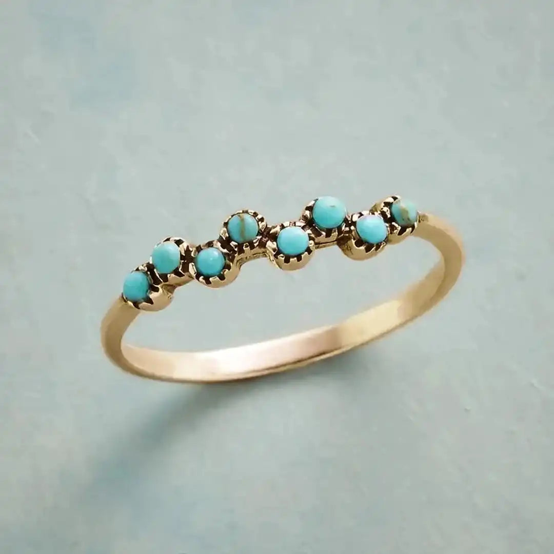 Bague en perles turquoise intemporelle