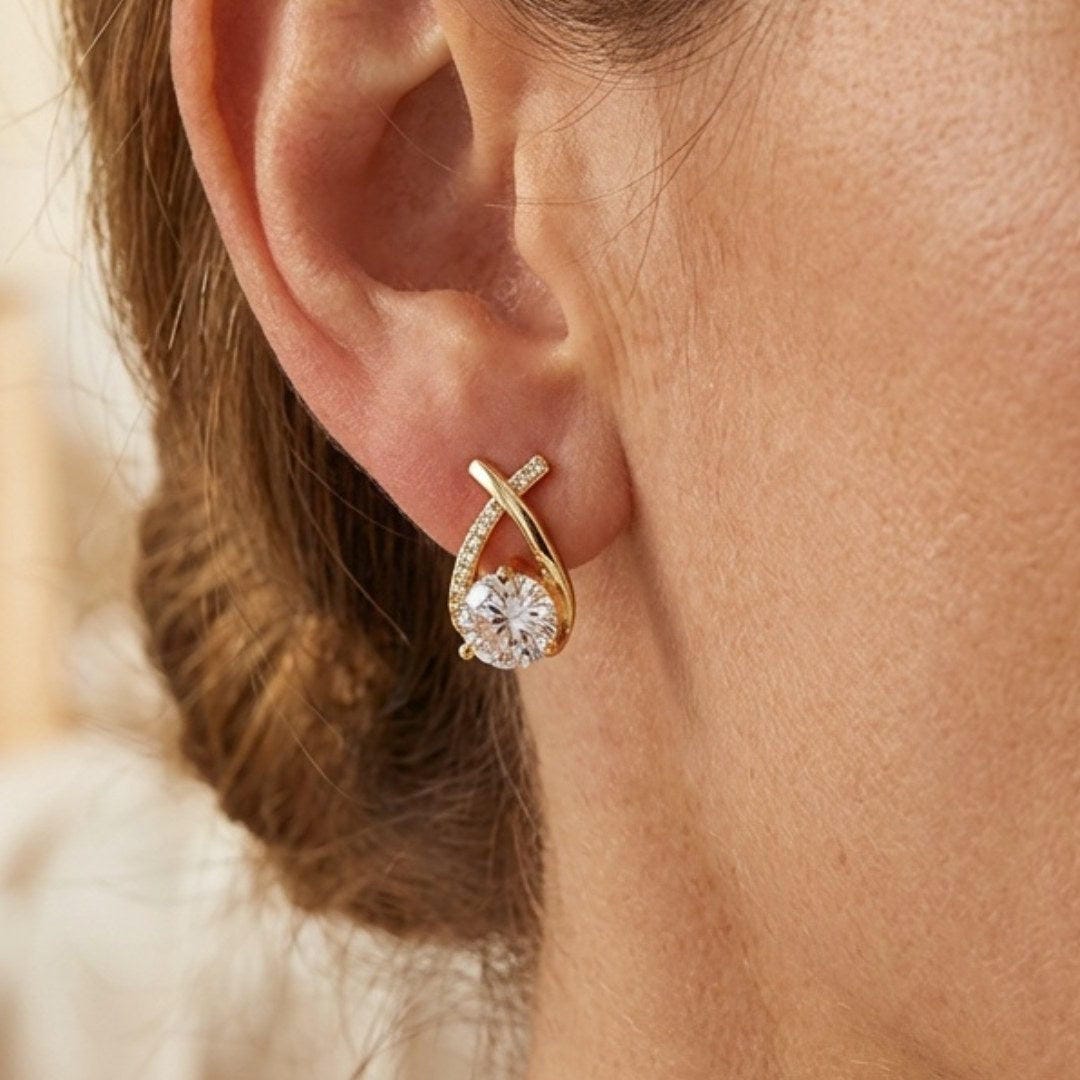 Boucles d'oreilles en cubic zirconia tordues de luxe