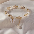 Jolie bracelet en perles avec un papillon