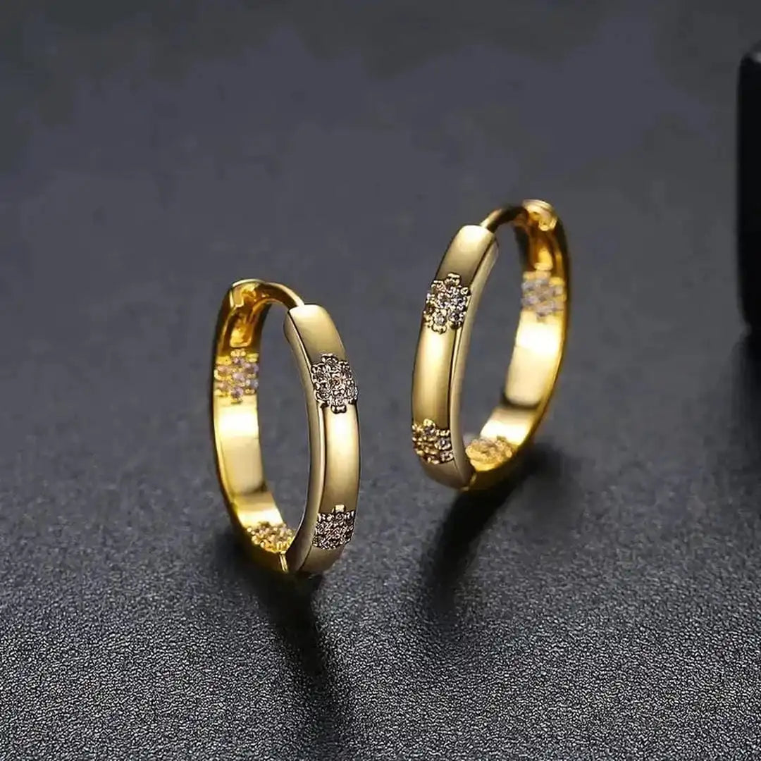 Boucles d'oreilles vintage en forme de fleur dorée