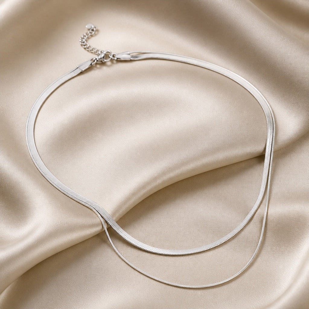 Collier superposé en or blanc serpent