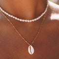 Collier pendentif en coquillage Cowrie