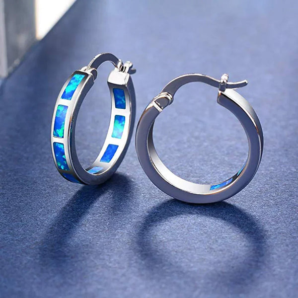 Boucles d'oreilles en cercle en opale bleue