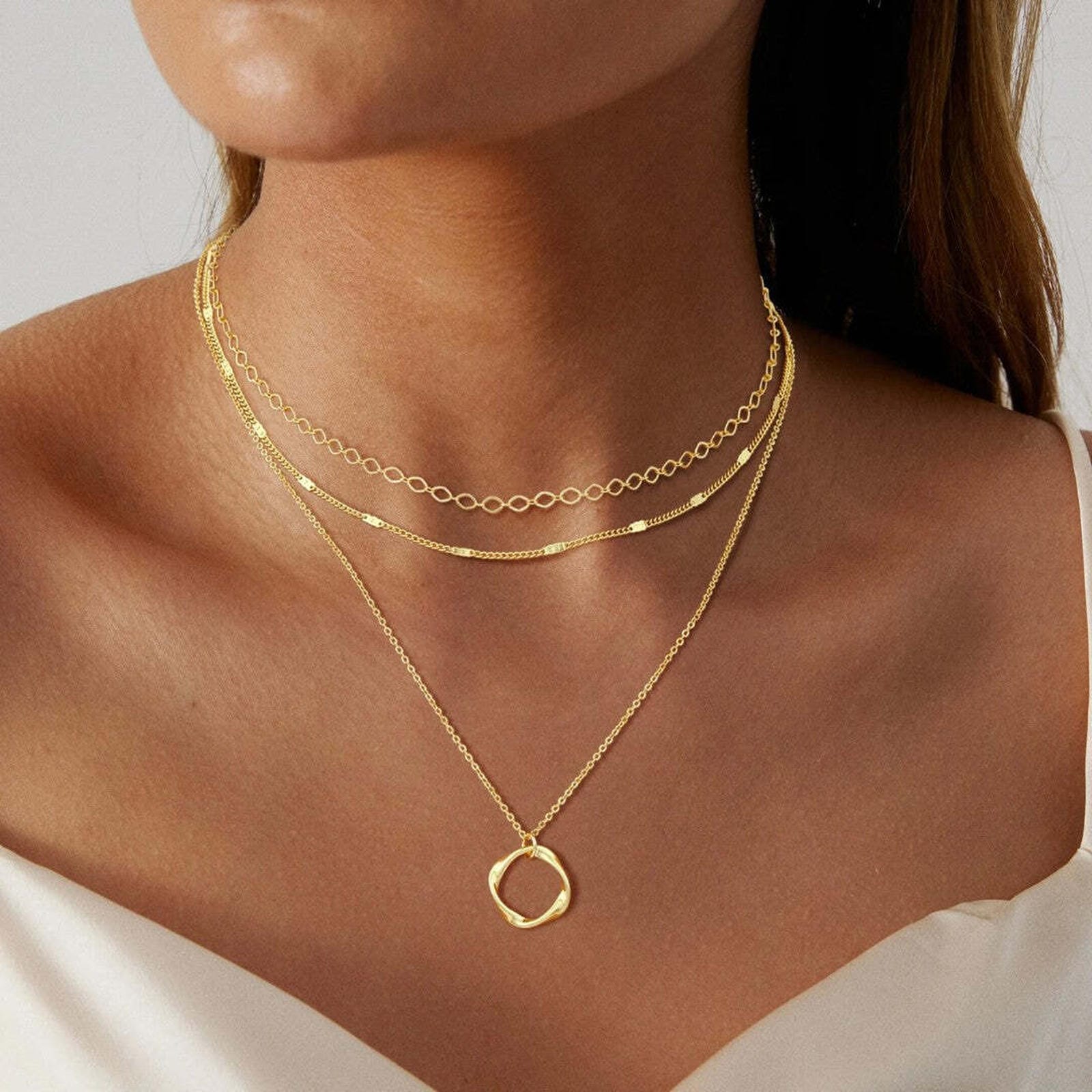 Collier pendentif à couches dorées classique
