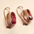 Boucles d'oreilles vintage en pierre rouge