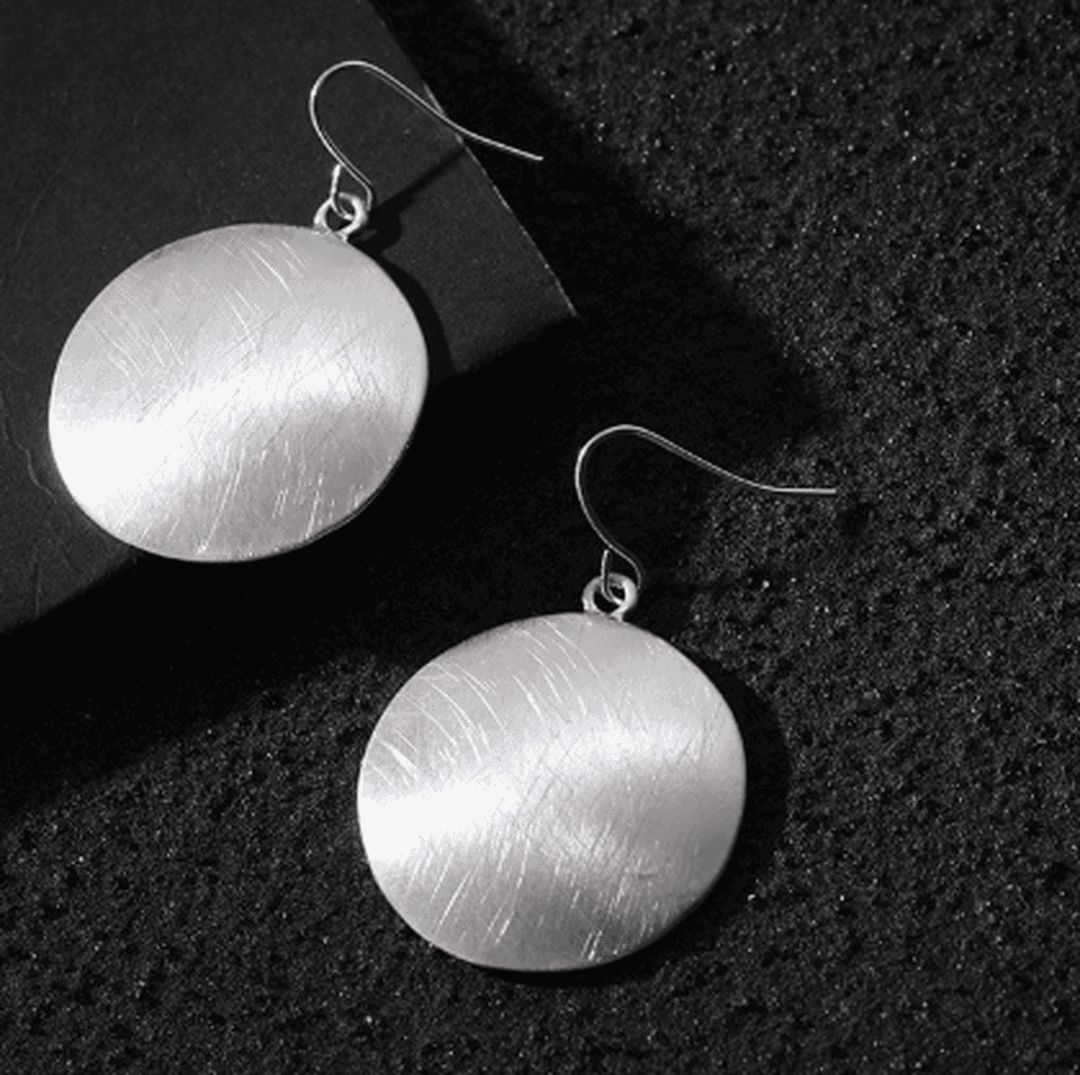 Boucles d'oreilles en enregistrement rétro doré