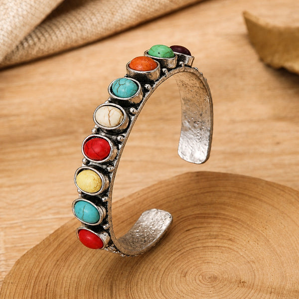 Bracelet en perles multicolores avec pendentif en pierre précieuse