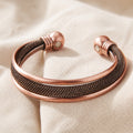 Bracelet en cuivre Cairn ancien