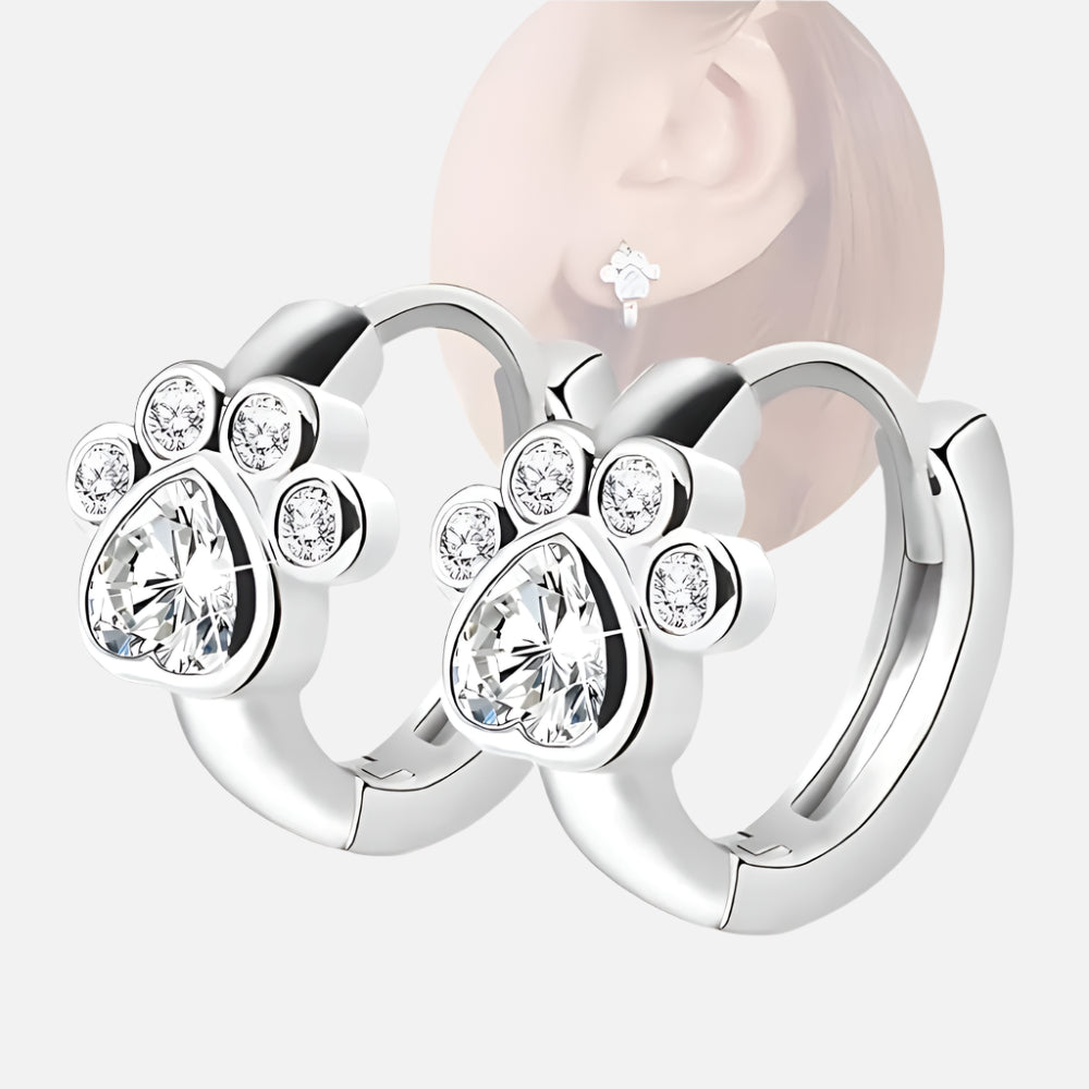 Boucles d'oreilles en forme de patte avec des zircons scintillants