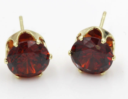Puces d'oreilles rondes rubis