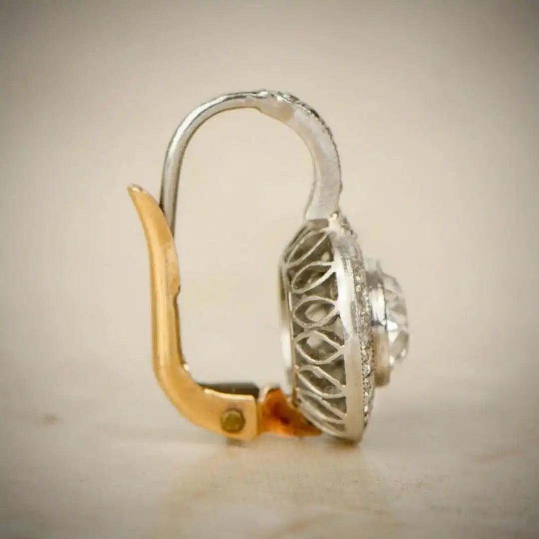 Boucles d'oreilles vintage en or et argent avec cristaux