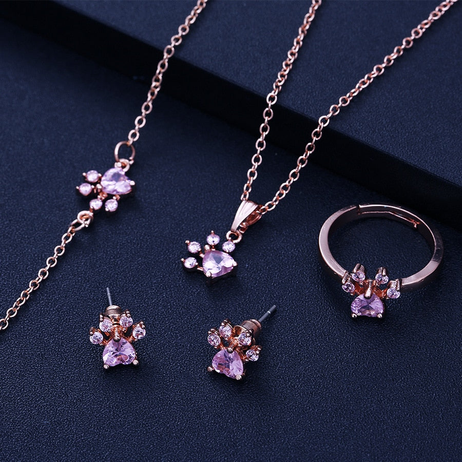 Ensemble de bijoux en or rose – 4 pièces bague en zircon, collier, boucles d'oreilles, bracelet