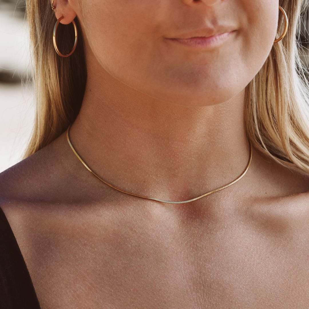 Collier carré en serpent doré