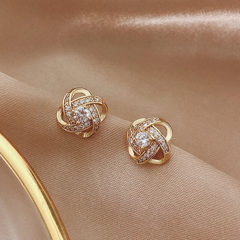 Boucles d'oreilles en cristal clover à spirale