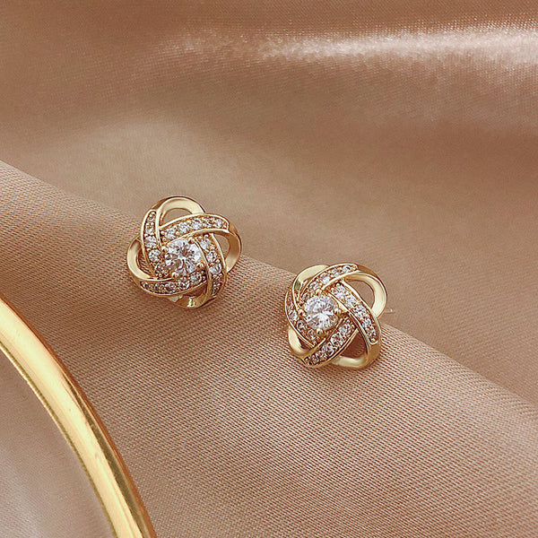 Boucles d'oreilles en cristal clover à spirale