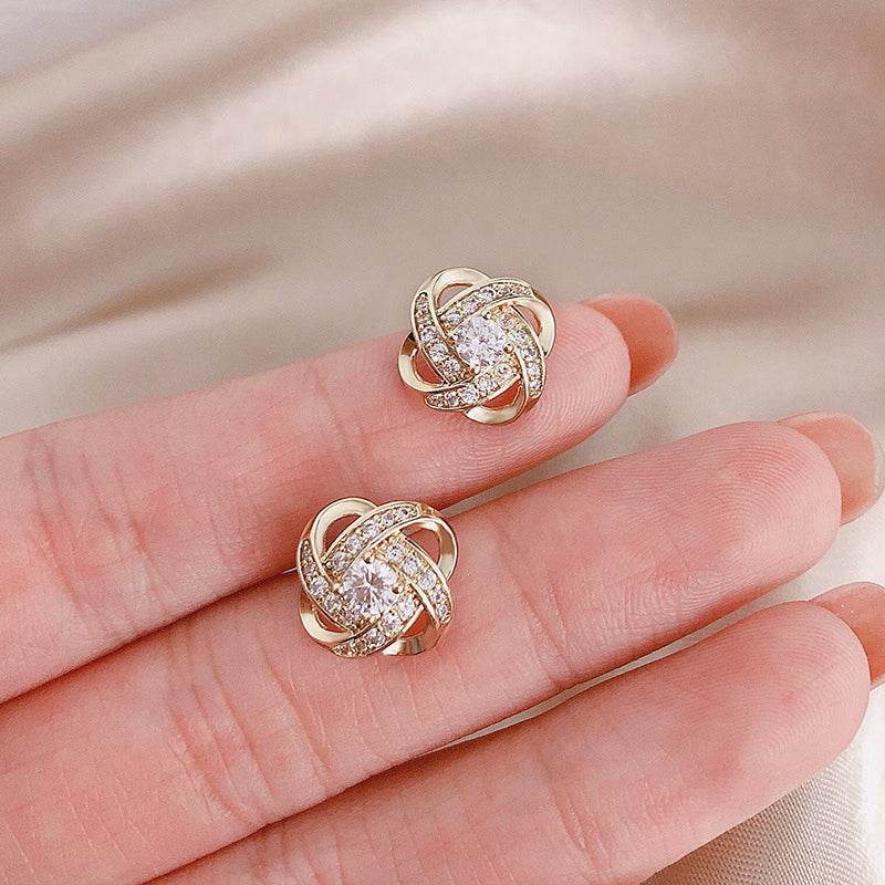 Boucles d'oreilles en cristal clover à spirale